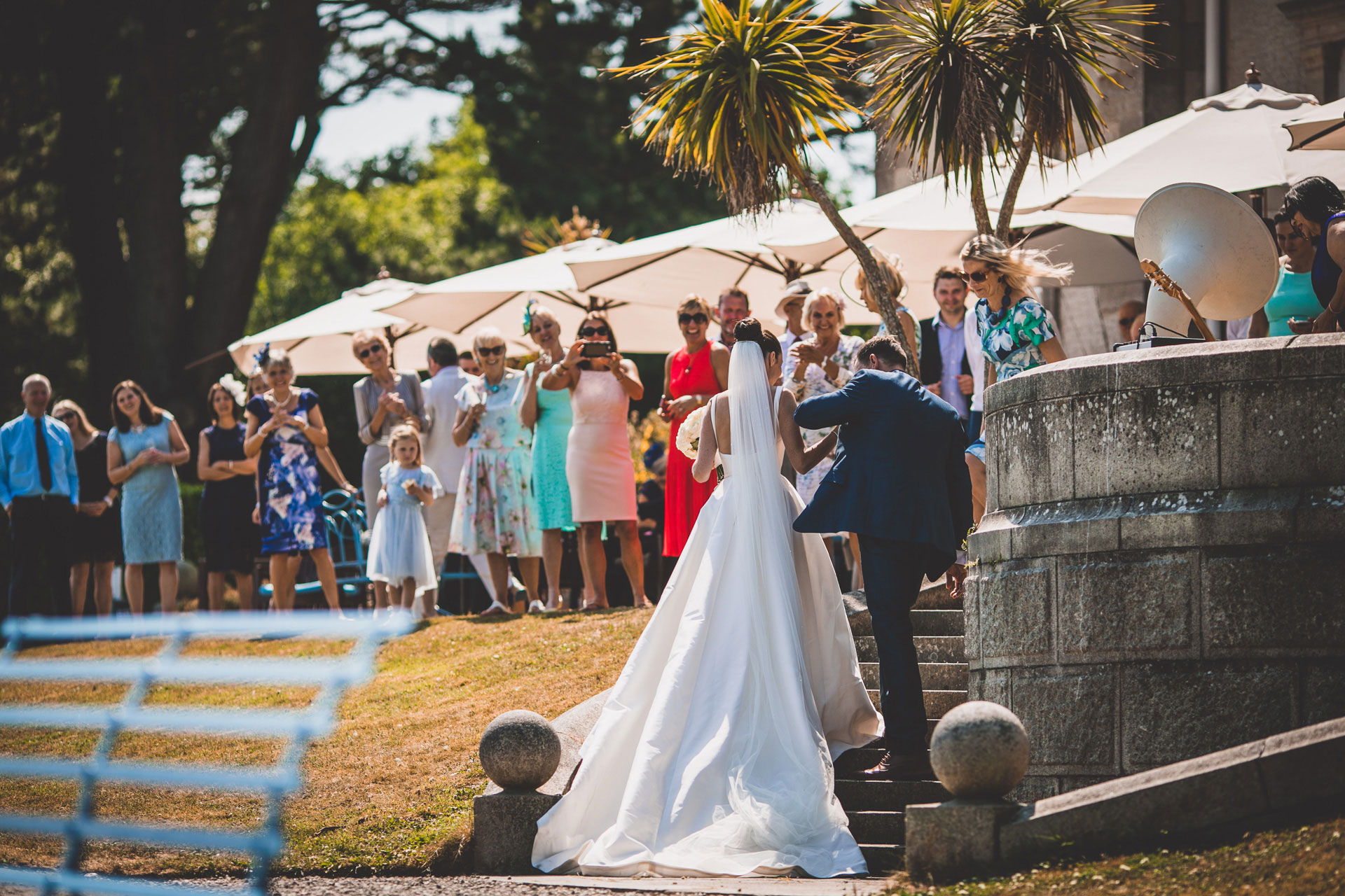 Married-couple-arriving-to-reception-fowey-hall-hotel-cornwall